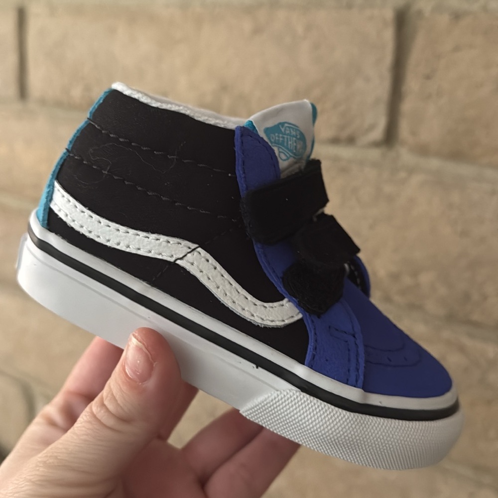 Black and Blue High-Top Sneakers with Cushioned Sole and Breathable Mesh